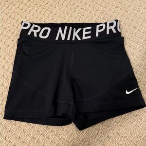 nike pros black size medium